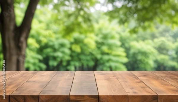 Obraz Wooden Tabletop with Beautiful Green Forest Background and Sunlight.  ideal for nature-inspired designs or product backgrounds.
