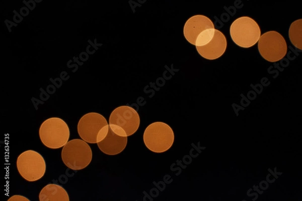 Obraz Spotted background of group of orange circles on black