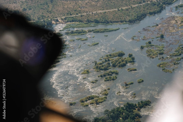 Fototapeta View from helicopter flying towards Victoria Falls between Zambia and Zimbabwe, Africa