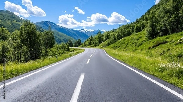 Fototapeta Scenic winding road surrounded by lush greenery and mountains under a bright blue sky : Generative AI