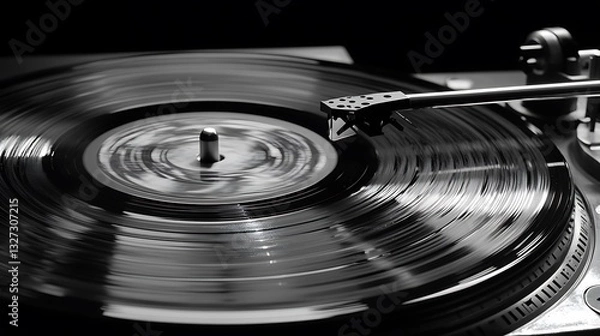 Fototapeta Close-up of a vinyl record spinning on a turntable.