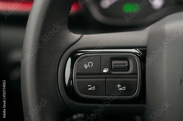 Obraz Volume level control on the steering wheel.