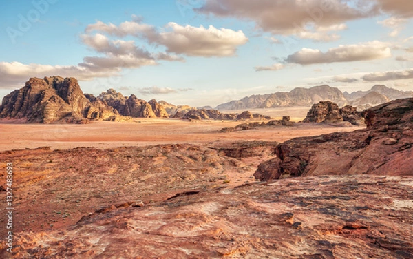 Fototapeta Planet Mars like arid landscape in Wadi Rum desert, Jordan, barren countryside with only rocks and sand