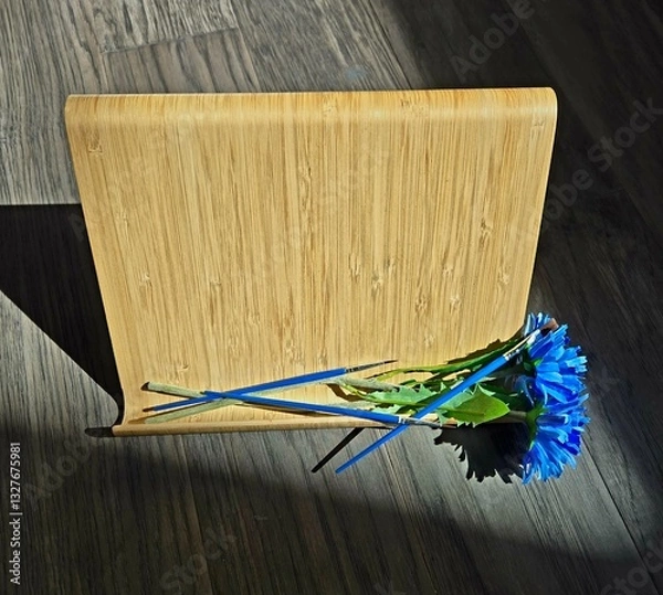 Fototapeta A Single Blue Blossom and the Quiet of Creation