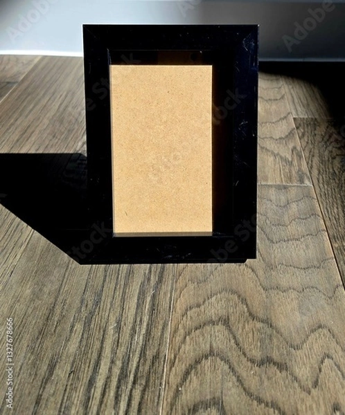 Fototapeta Framed by Light: An Empty Canvas of Memories