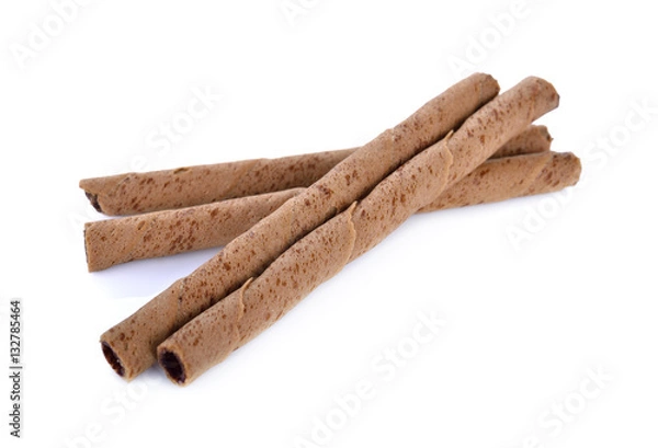 Obraz pastry rolled wafer chocolate fudge on white background