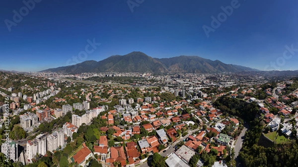 Fototapeta panoramic view of Caracas and the iconic mountain named Avila, Showing a wide view of Caracas City