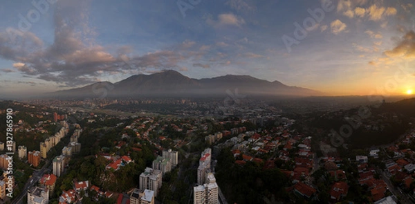 Fototapeta sunrise panoramic view of Caracas and the iconic mountain named Avila, Showing a wide view of Caracas City