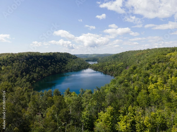 Fototapeta Aerial view of Bean and Bear Lakes in Silver Bay, Minnesota, surrounded by lush forests.
