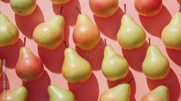 Fototapeta Multiple Pera Coscia pears filling entire frame, asymmetrical natural arrangement showing size variations, detailed capture of their smooth skin transitioning from lime green to rose red, visible