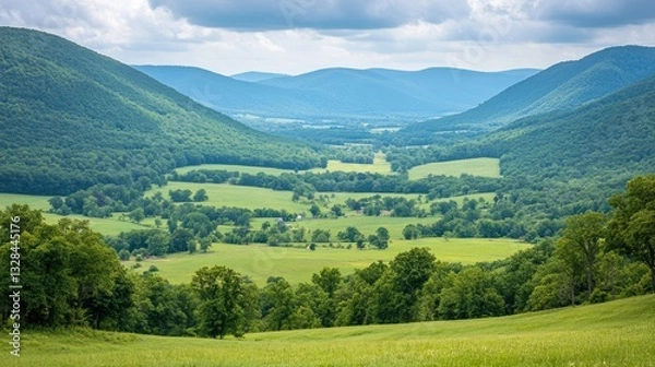 Obraz Scenic view of mountains valleys and lush green vegetation