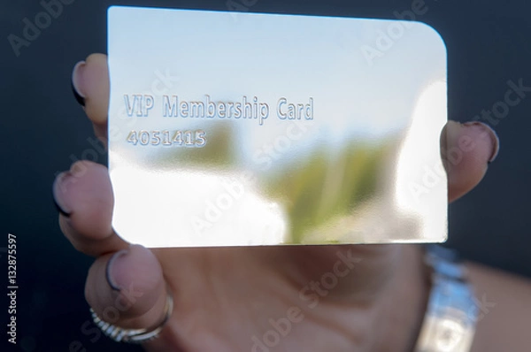 Obraz holding a silver vip card