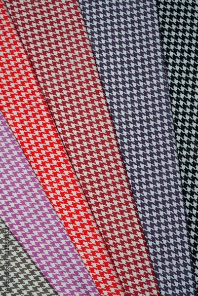 Obraz Multi-colored fabric patterns with geometric pattern for sewing.