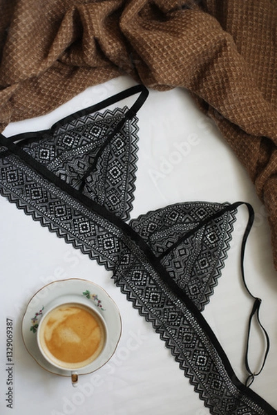 Fototapeta Woman's silk erotic lingerie on the white bed sheets. Valentine's day concept. Lace sexy female underwear. Beauty, fashion blogger concept. Female bra, panties, erotic clothes. Lingerie advertising