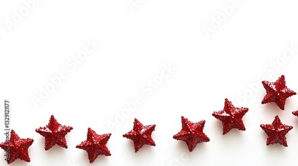 Fototapeta A dazzling, red starburst glitters with tiny, reflective pieces arranged diagonally on a pristine white canvas, casting a mesmerizing sparkle and vibrancy