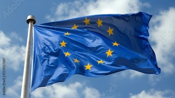 Fototapeta European Union EU flag on a pole waving in the wind with a blue sky on a sunny day as background
