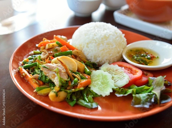 Fototapeta  spicy food fried pork with basil leaf