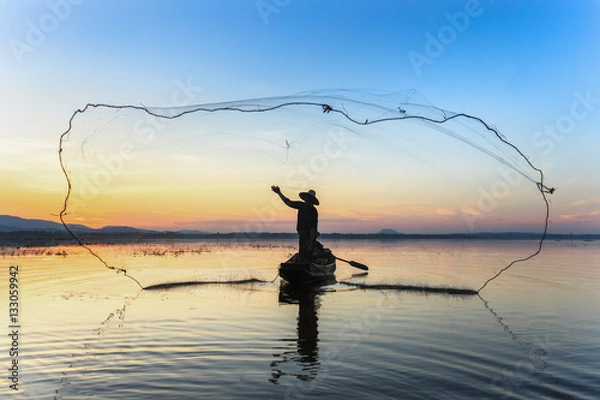 Obraz Rybacy łowiący we wczesnym poranku złote światło