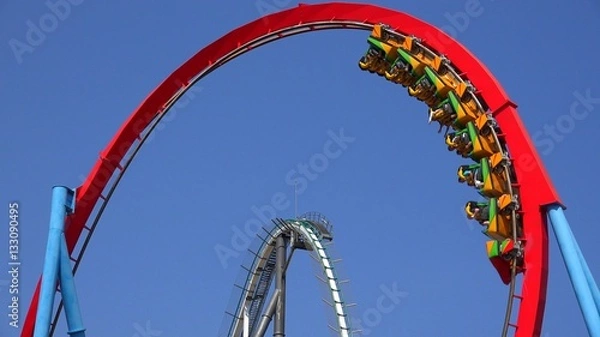 Fototapeta Two Rollar Coasters At Theme Park