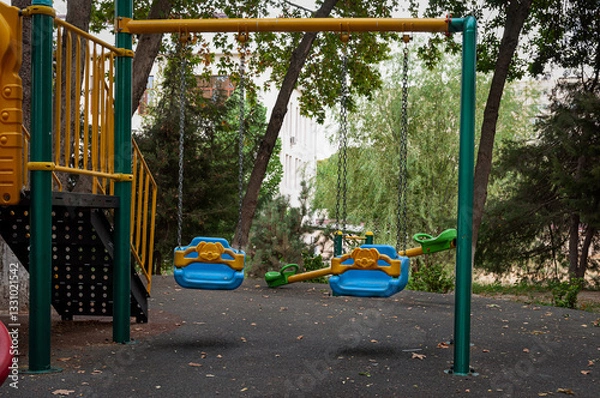 Obraz Small swing on the playground. 