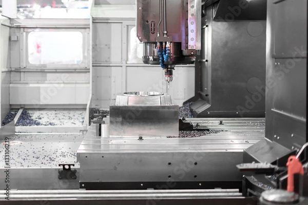 Obraz High precision CNC machining center working, operator machining