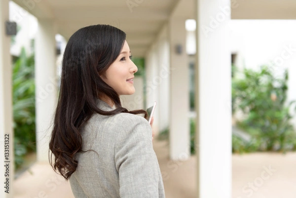 Fototapeta 微笑むビジネスウーマン