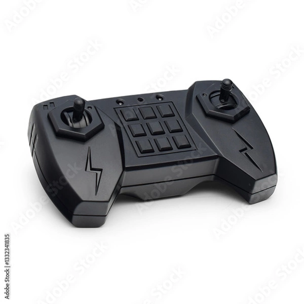 Fototapeta A black remote control for a toy vehicle or quadcopter on a white background. A joystick from a radio-controlled vehicle.