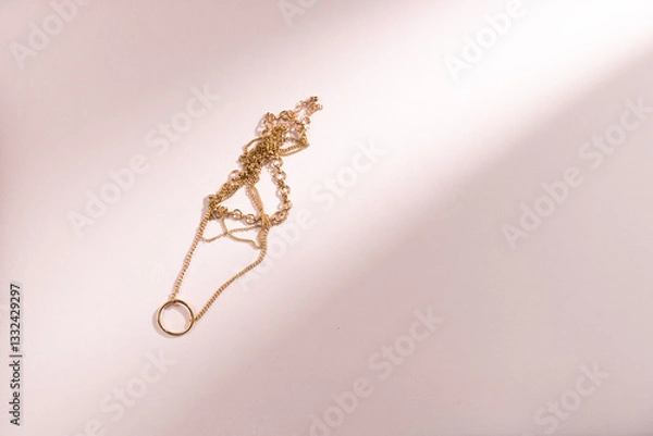 Fototapeta Necklaces on a pink background. Flat lay, top view. Copy space
