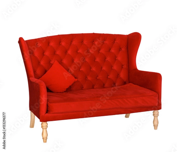 Obraz soft red sofa with a pillow isolated on white. Armchair with fabric upholstery