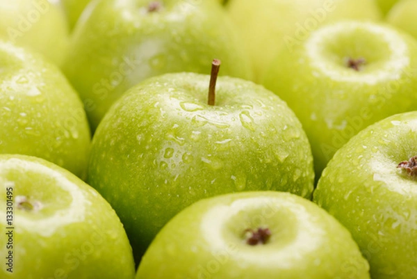 Obraz Green fresh apples close up, selective focus.