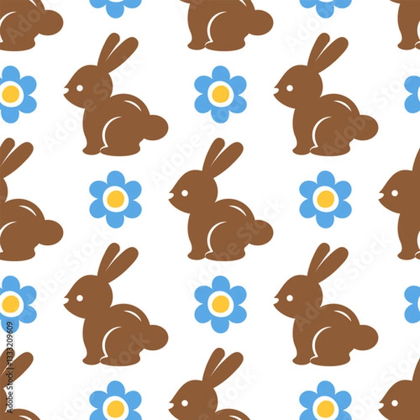 Fototapeta Easter seamless pattern with chocolate rabbits and blue flowers on white background. Background with Easter bunnies and daisies. Cute hand drawn background for Easter cards, textile prints, wallpapers