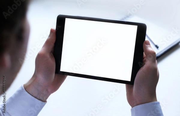 Fototapeta ipad mini tablet. A tool for business people. The simplicity and perfection. 