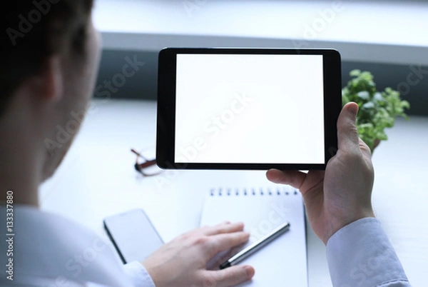 Obraz Working with the tablet. Man