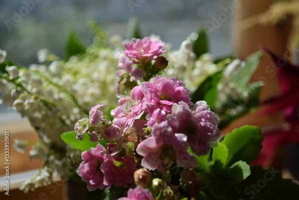 Fototapeta Spring Bouquet of Lilies of the Valley and Pink Flowers by the Window
