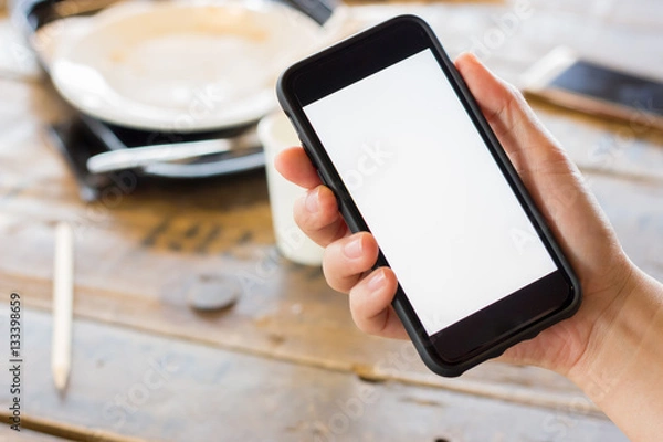 Obraz hand using cell phone with white screen