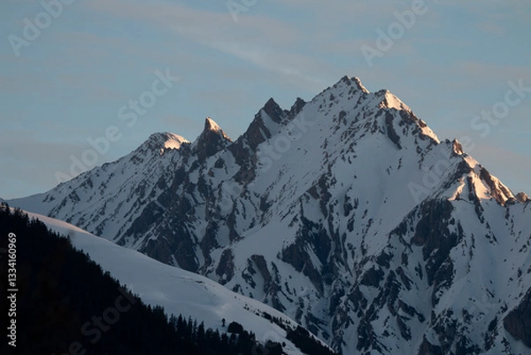 Obraz First Light on Winter Peaks