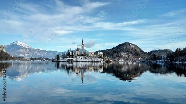 Obraz Blue sky and lake with island with a church in the middle of