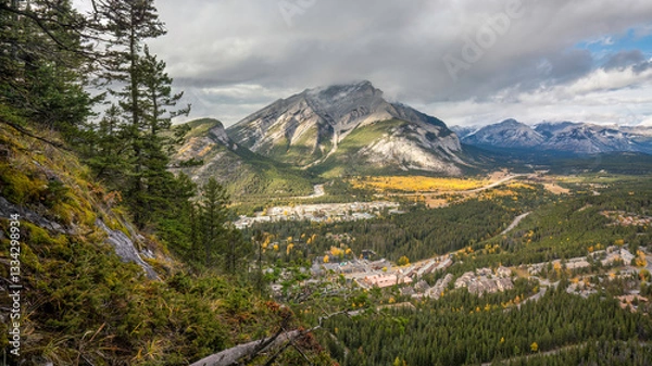 Fototapeta Rocky Mountains in the distance looking over the Trans Canada Highway and Cascade Mountain in the Banff National Park - taken from Tunnel Mountain
