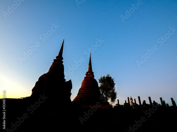 Obraz Ancient Sukhothai Chedis at Sunset