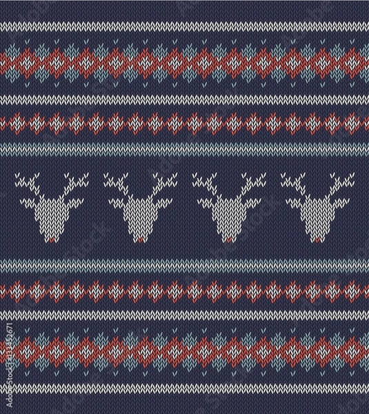 Fototapeta Knitted  texture on blue background with deers