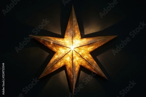 Fototapeta A shimmering gold star light illuminated against a pitch-black background, with each point of the star emitting a soft glow, bringing an enchanting and magical feeling to the scene.