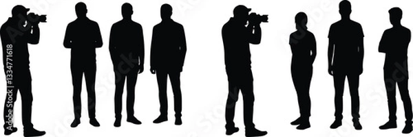 Fototapeta Black and white silhouette of a photographer on the left taking a photo of three people standing in a line on the right, emphasizing the act of photographing a group.