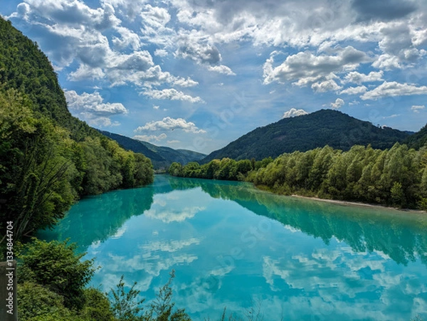 Obraz Soca Valley, Slovenia – Aerial view of the emerald-green Alpine River Soca on a bright sunny summer day with green foliage..The last wild river in Europe in Triglav National Park near the Vricic Pass