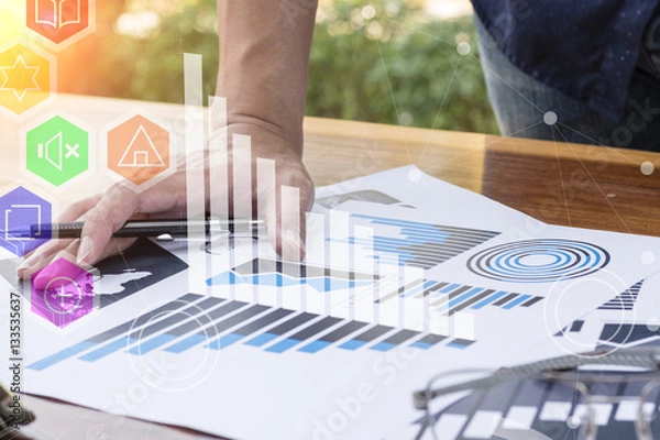 Fototapeta businessman hand working with new modern computer and business s