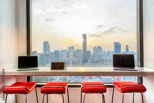 Fototapeta Red chairs by the window