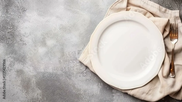 Obraz A simple, elegant empty plate rests on a beige linen napkin against a rustic brown background, perfect for presentations.