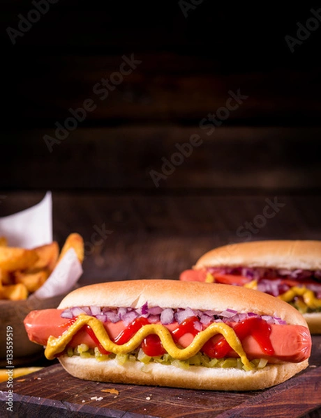 Obraz  Hot Dog With Yellow Mustard, Onion, Pickles and French Fries
