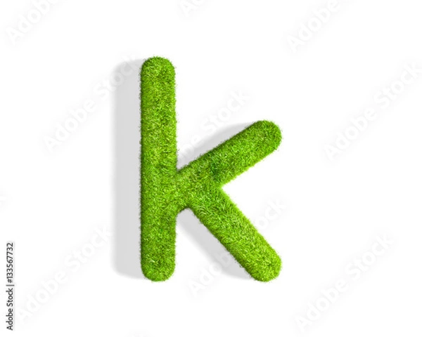 Fototapeta Grass letter K in lowercase format from top angle with shadow on ground.