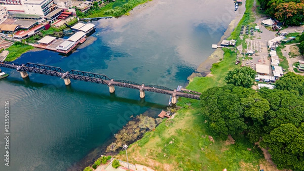 Obraz The Bridge on the River Kwai, Kanchanaburi, Thailand.The Death Railway, World War II, by the Japanese Army, which conscripted approximately 61,700 Allied prisoners of war. Opened 1943. Drone view.