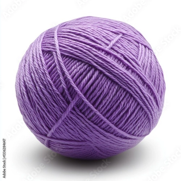 Obraz Here is a ball of yarn. It is a light purple color. The yarn is wound tightly into a round shape.